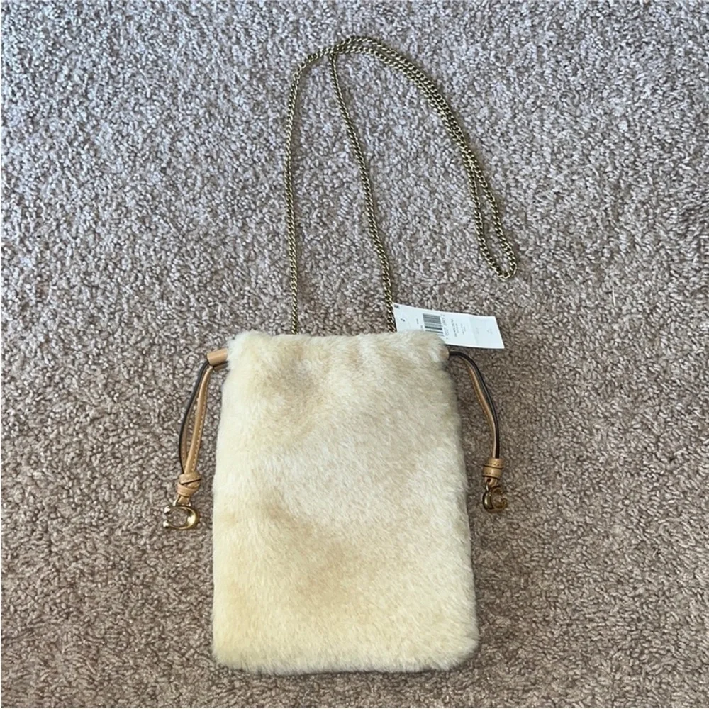Coach natural shearling mini drawstring crossbody NWT
